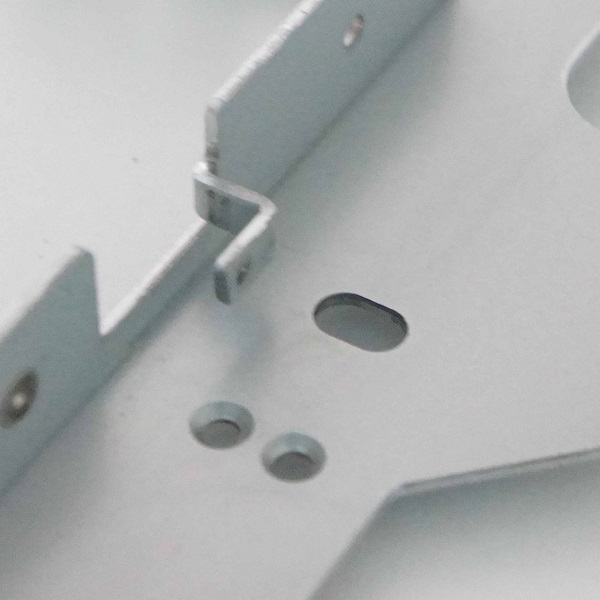 主机架五金冲压件沉孔图片 主机架五金冲压件沉孔图片